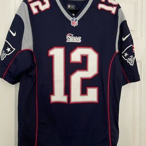 Tom Brady number 12 NFL official jersey bought at stadium for my son. Worn once